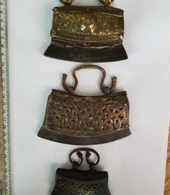 Three with full-front metal decoration